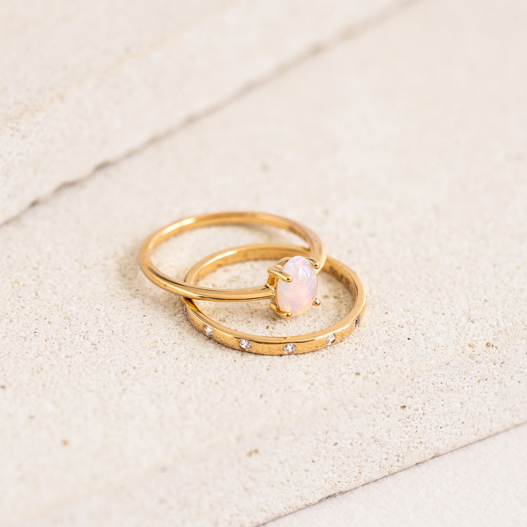 Stacking ring with bezel-set gemstones and opal ring in gold vermeil