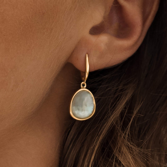 Gemstone pendant dangle earrings with green amethyst in gold vermeil on model