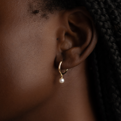 14k gold huggie earrings with pearl alicia on ear