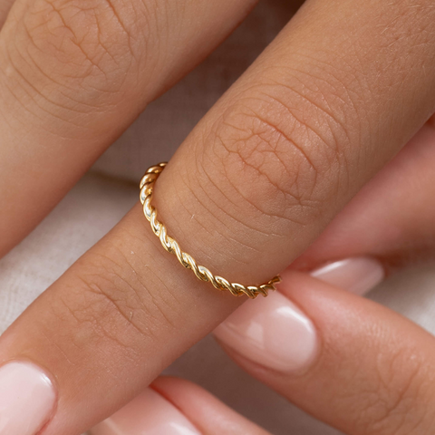Dagmar Twist Gold Ring on finger 