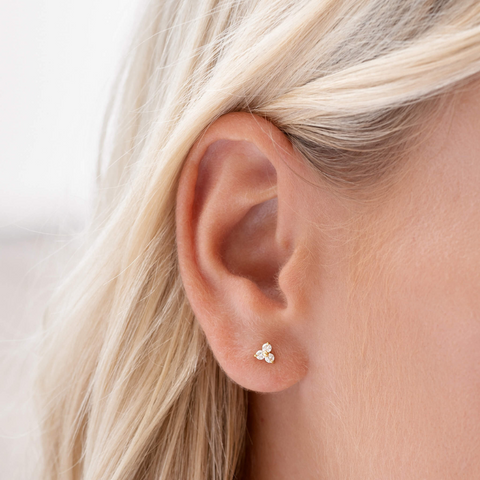 Trillium Stud Earrings on ear 