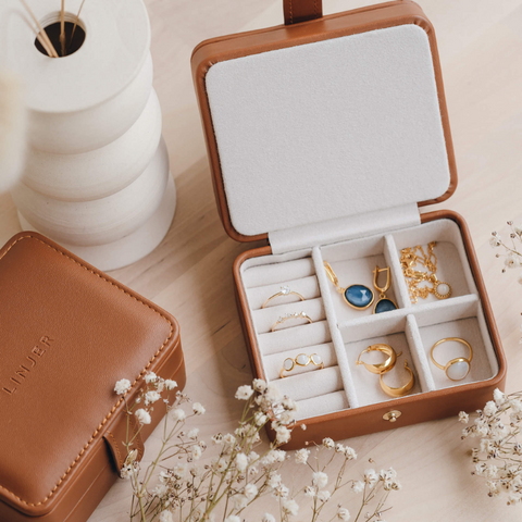 Gold vermeil jewelry in cognac travel jewelry case