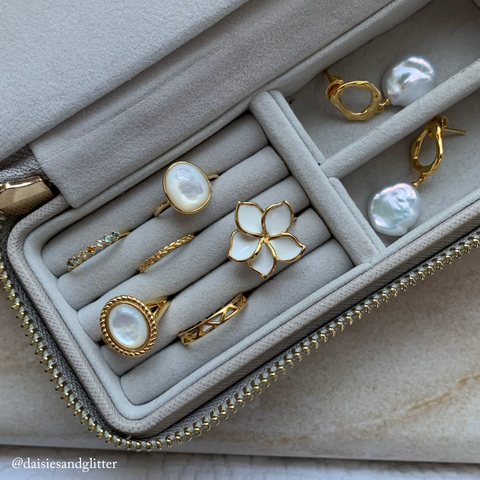Gold vermeil rings and earrings in jewelry box