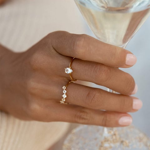 Nesting White Topaz Gemstone Ring Set in Gold on hand