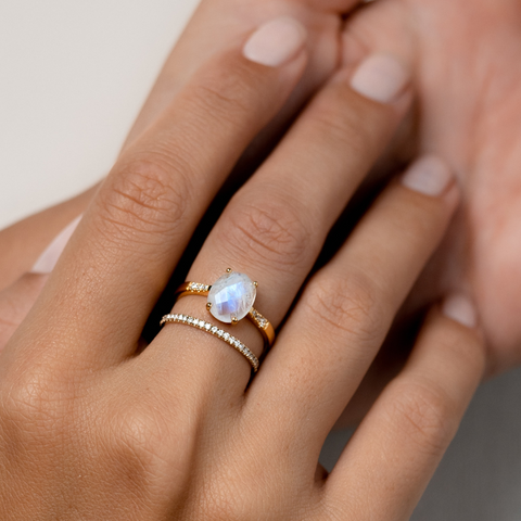 Moonstone ring and open ring in gold vermeil on finger