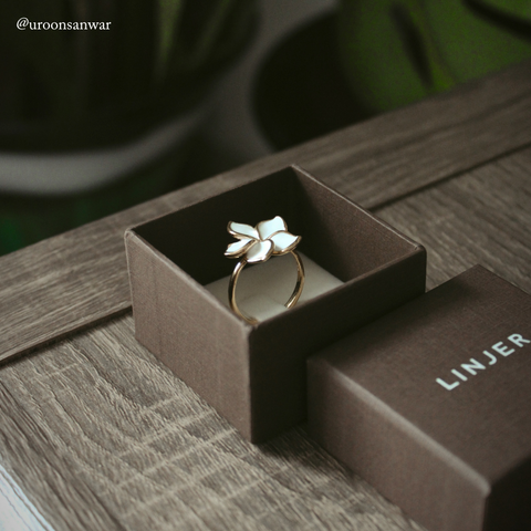 Plumeria flower ring standing in jewelry box