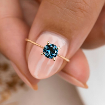 London Blue Topaz Meaning - 14k Gold Solitaire Ring - Lilly Luxe